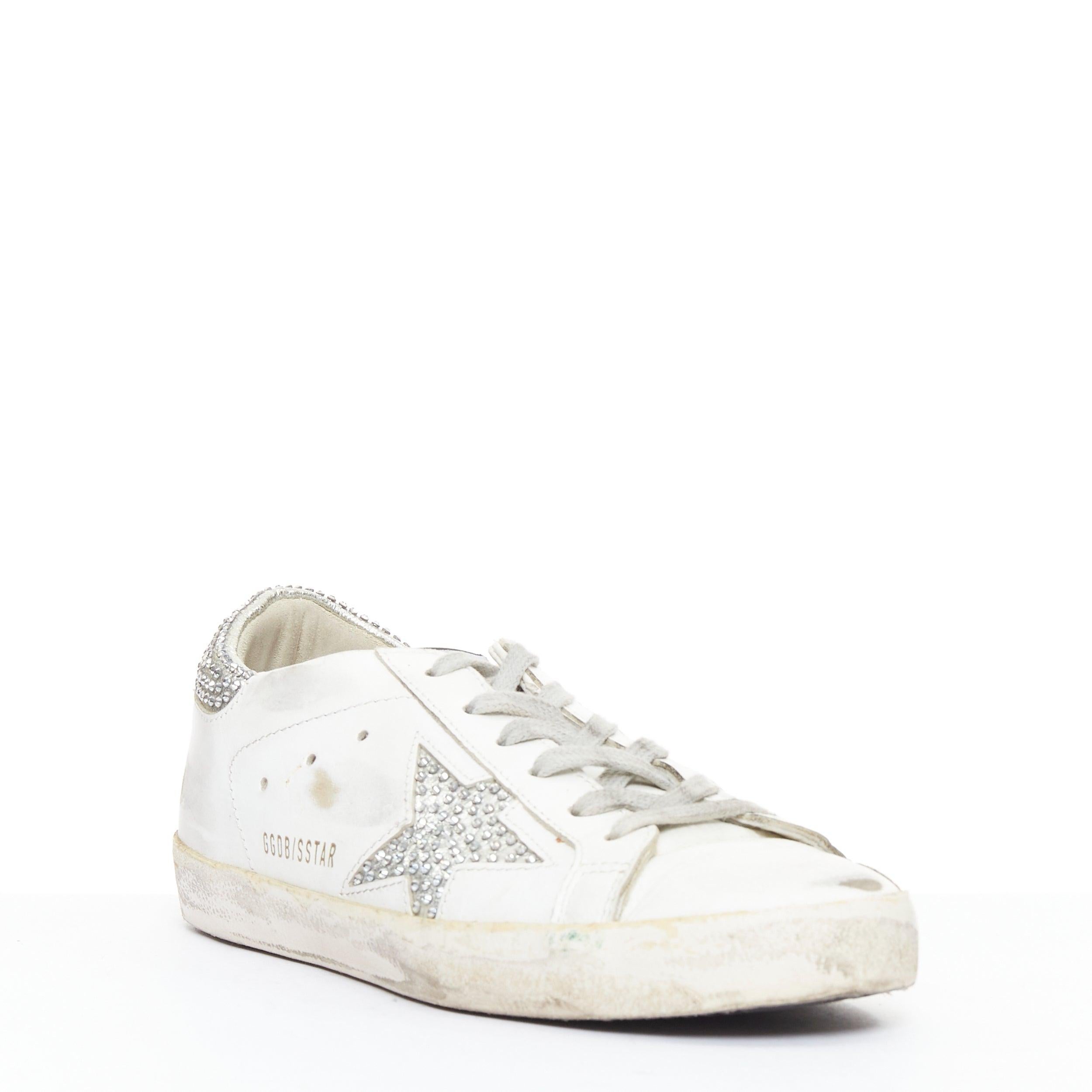GOLDEN GOOSE Super Star silver crystal strass white distressed sneakers EU36
Reference: TGAS/E00737
Brand: Golden Goose
Model: Super Star
Material: Leather
Color: White, Silver
Pattern: Solid
Closure: Lace Up
Lining: White Leather
Extra Details: