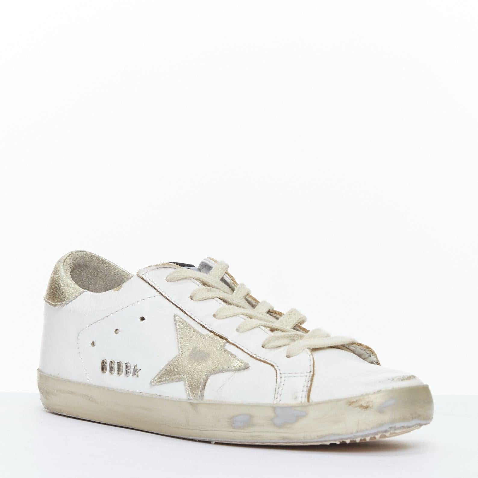 GOLDEN GOOSE Superstar blanco oro estrella cuero zapatillas desgastadas EU37
Referencia: KYCG/A00114
Marca: Golden Goose
Model No: Superestrella
Material: Piel
Color: blanco, dorado
Patrón: Estrella
Cierre: Cordón
Forro: Piel blanca
Detalles