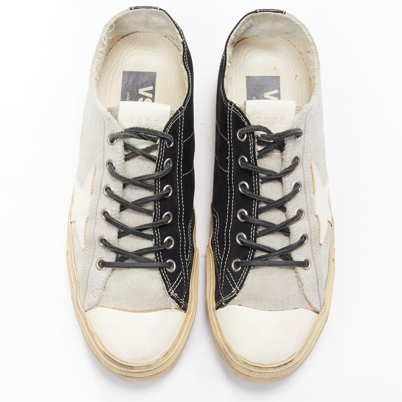 GOLDEN GOOSE VSTAR2 bicolor grey black distressed leather sneakers EU40
Reference: CNLE/A00225
Brand: Golden Goose
Model: VSTAR2
Material: Leather
Color: Grey, Black
Pattern: Solid
Closure: Lace Up
Lining: Cream Leather

CONDITION:
Condition: Very
