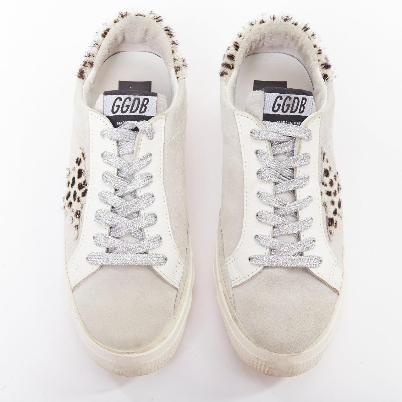 GOLDEN GOOSE Vstar2 cuir métallisé argenté zébré star distressed sneakers EU36
Référence : LAYU/A00106
Marque : Golden Goose
Modèle : Vstar2
Collectional : GGDB
MATERIAL : Cuir
Couleur : argent, jaune
Motif : Solide
Fermeture : Up&Up
Doublure : Cuir