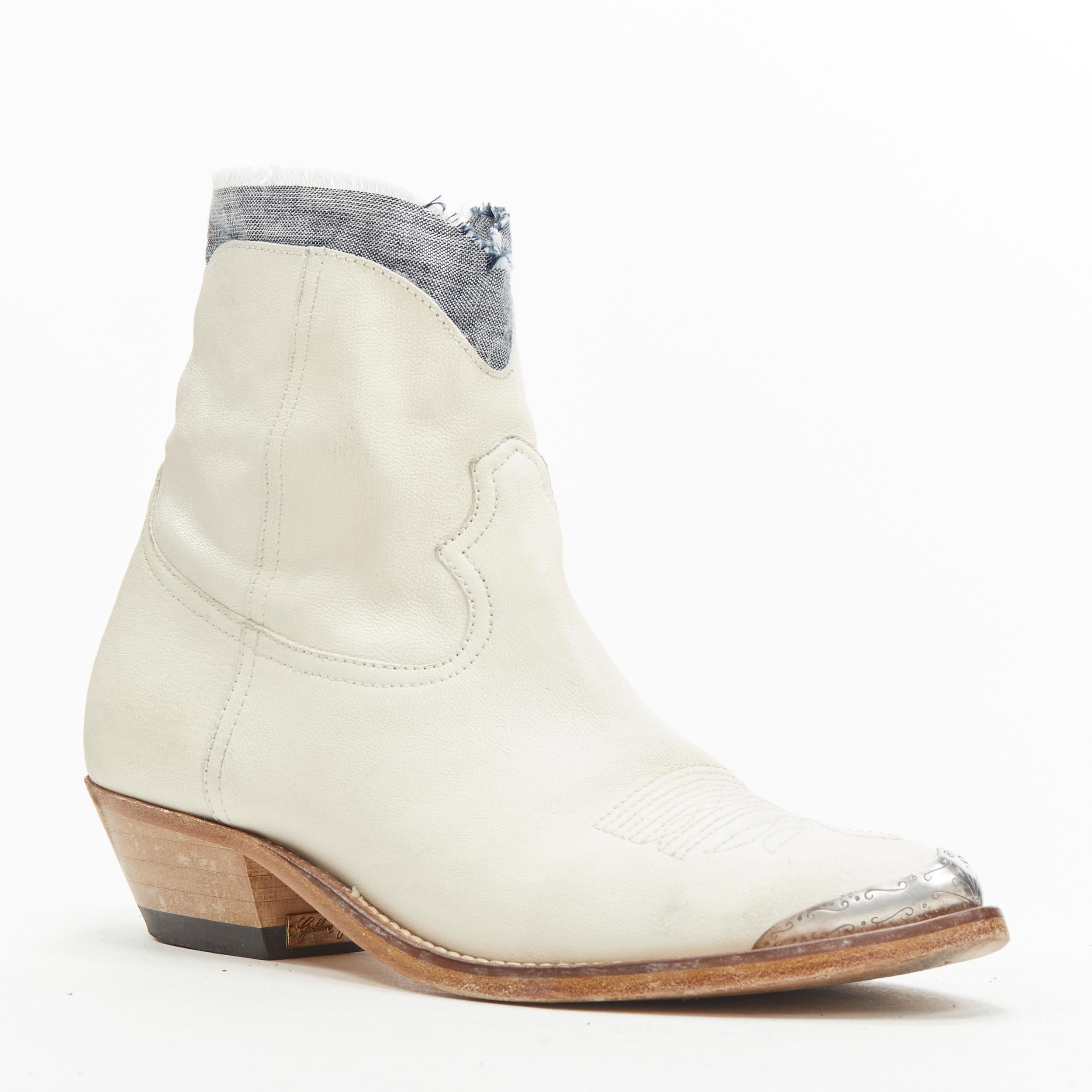 GOLDEN GOOSE white distressed leather drayed denim metal toe cowboy boots EU36
Reference: ANWU/A00173
Brand: Golden Goose
Material: Leather, Wood
Color: White
Pattern: Solid
Closure: Zip
Lining: Leather
Extra Details: Denim trim along opening.