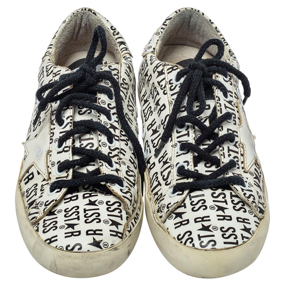 Enjoy footwear ease with this pair of sneakers by Golden Goose. They've been crafted from printed leather and are designed with a star motif on the sides, round toes, and lace-up on the vamps. The leather insoles and rubber soles add to the comfort