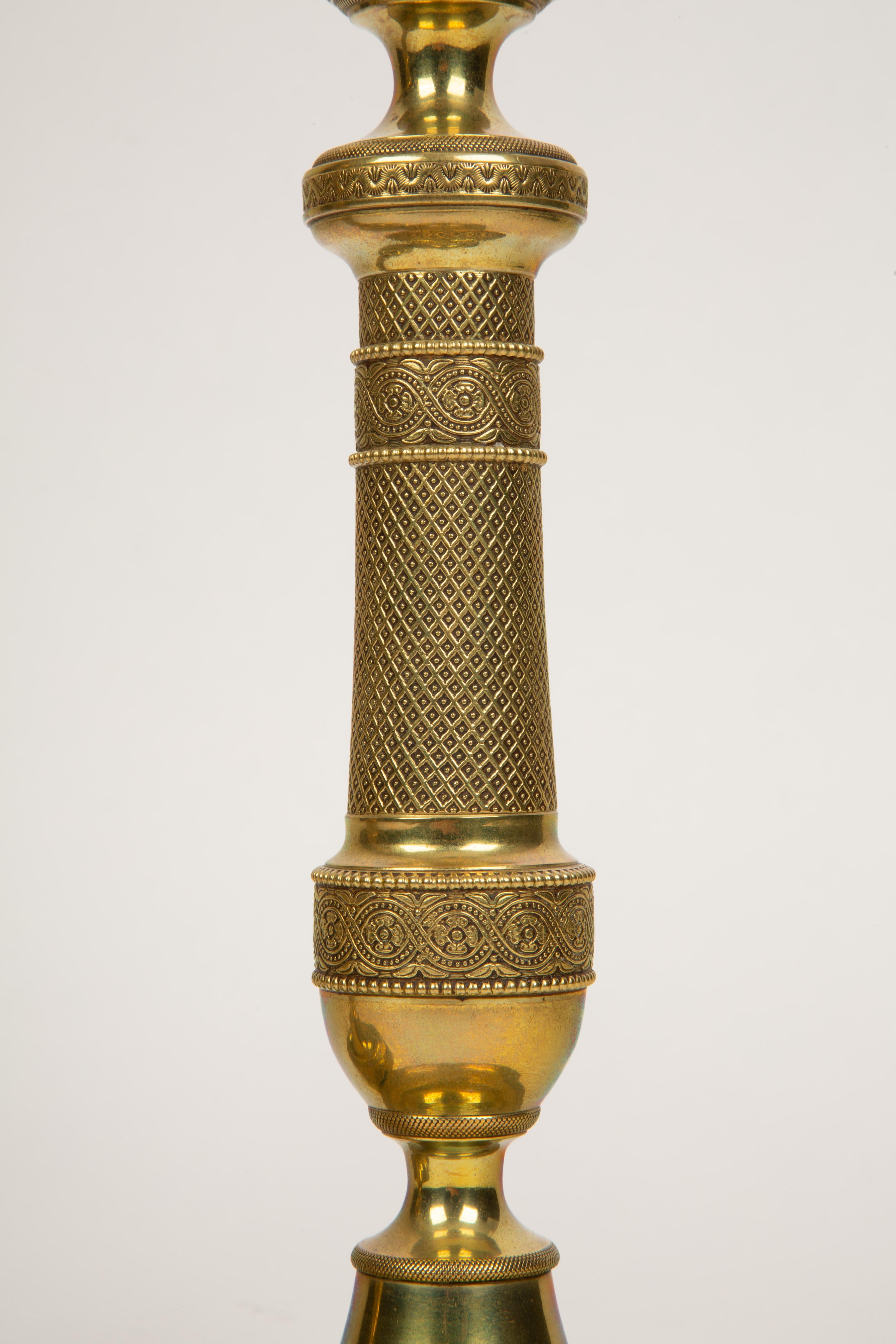 19th Century Golden Grandeur: Pair of French Restoration Gilt Bronze Candlesticks, Circa 1820