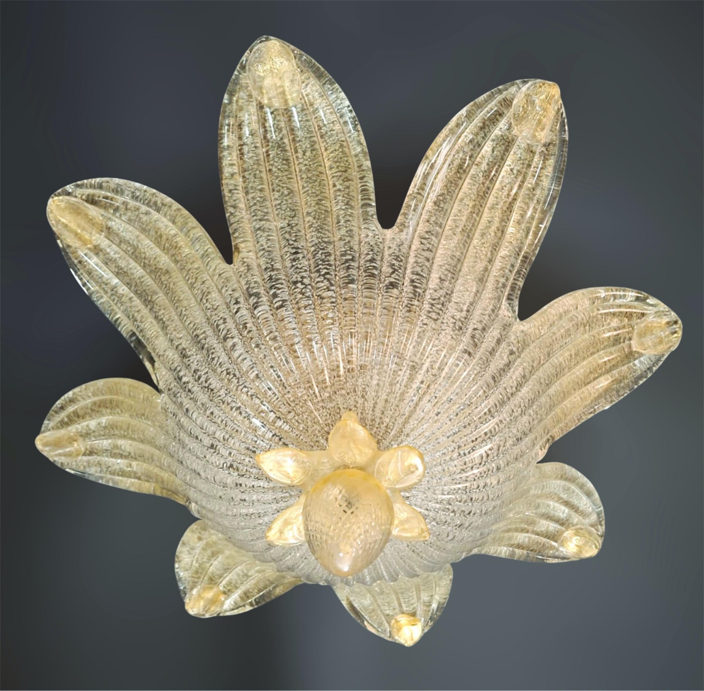 Italian flush mount with clear Murano glass diffuser hand blown in Graniglia technique to produce granular texture and glass decorations infused with gold  / Made in Italy in the style of Barovier e Toso, circa 1960s
Measures: diameter 22.5 inches,
