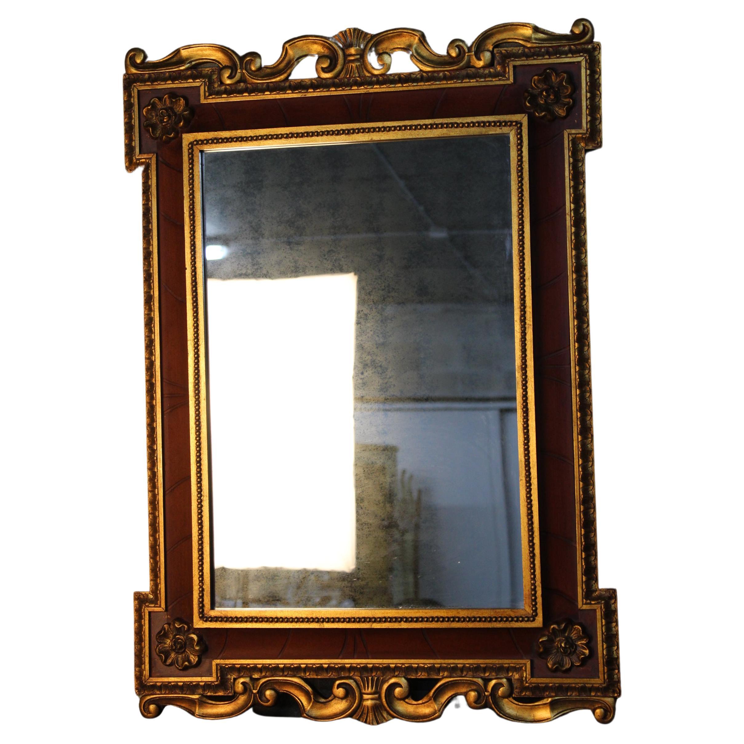 I offer a beautiful Early 20th century golden hand carved Italian wall mirror Louis XV Style French wall mirror. 
beautifully carved all around the frame with flower motifs 
Measure: 70 x 100 cm.

 