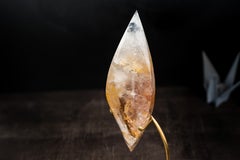 Fiamma di cristallo di quarzo guaritore dorato