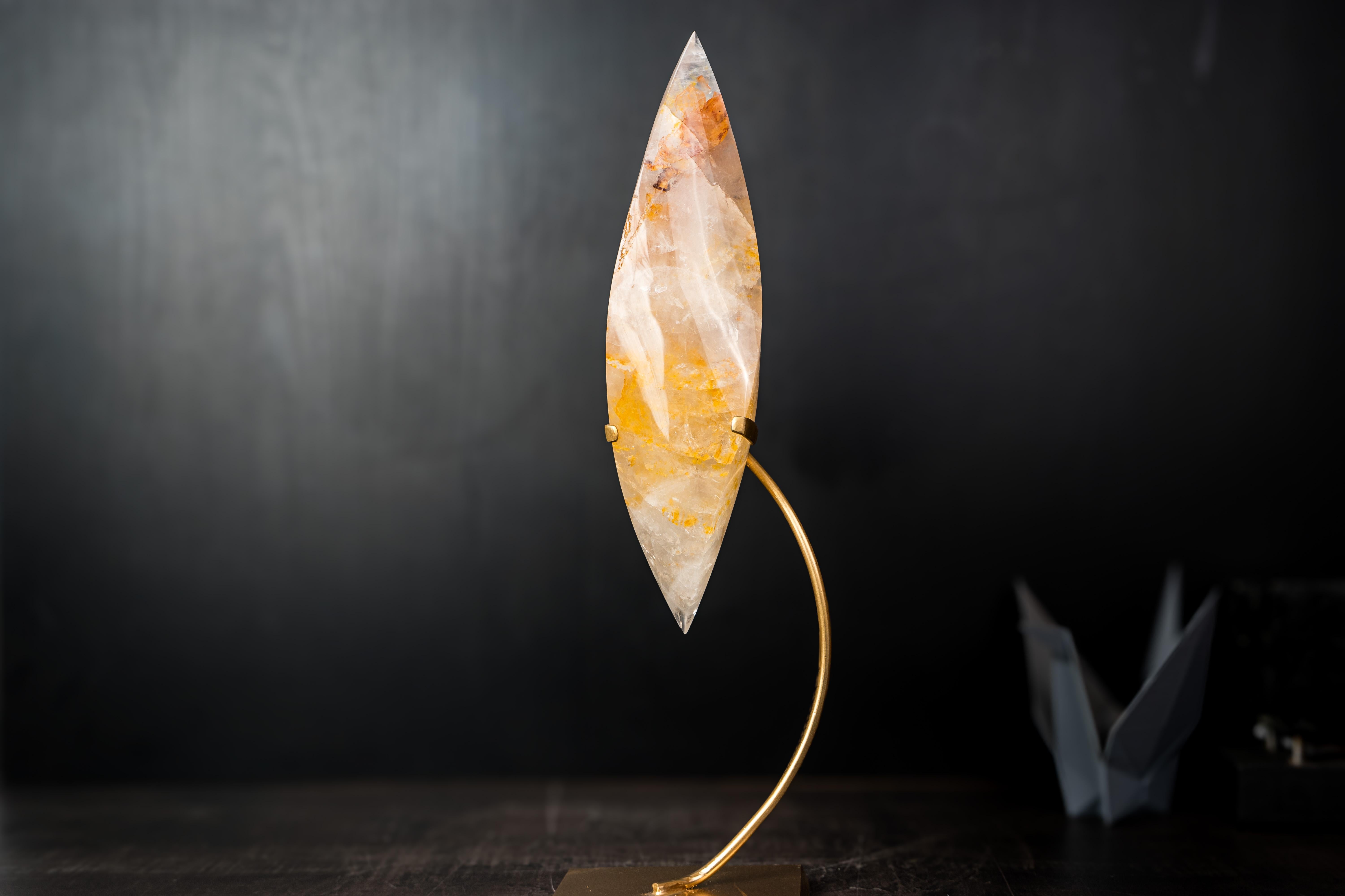 Delicate Golden Healer Quartz Crystal Flame Sculpture

▫️ Description

With its warm aesthetics and delicate lines created by expert craftsmanship, this exquisite Golden Healer (Hematoid Quartz) with Dendrite Inclusions sculpture immediately calls