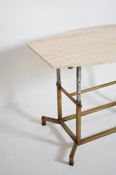 Table en fer doré et en fer et travertin, années 1970.