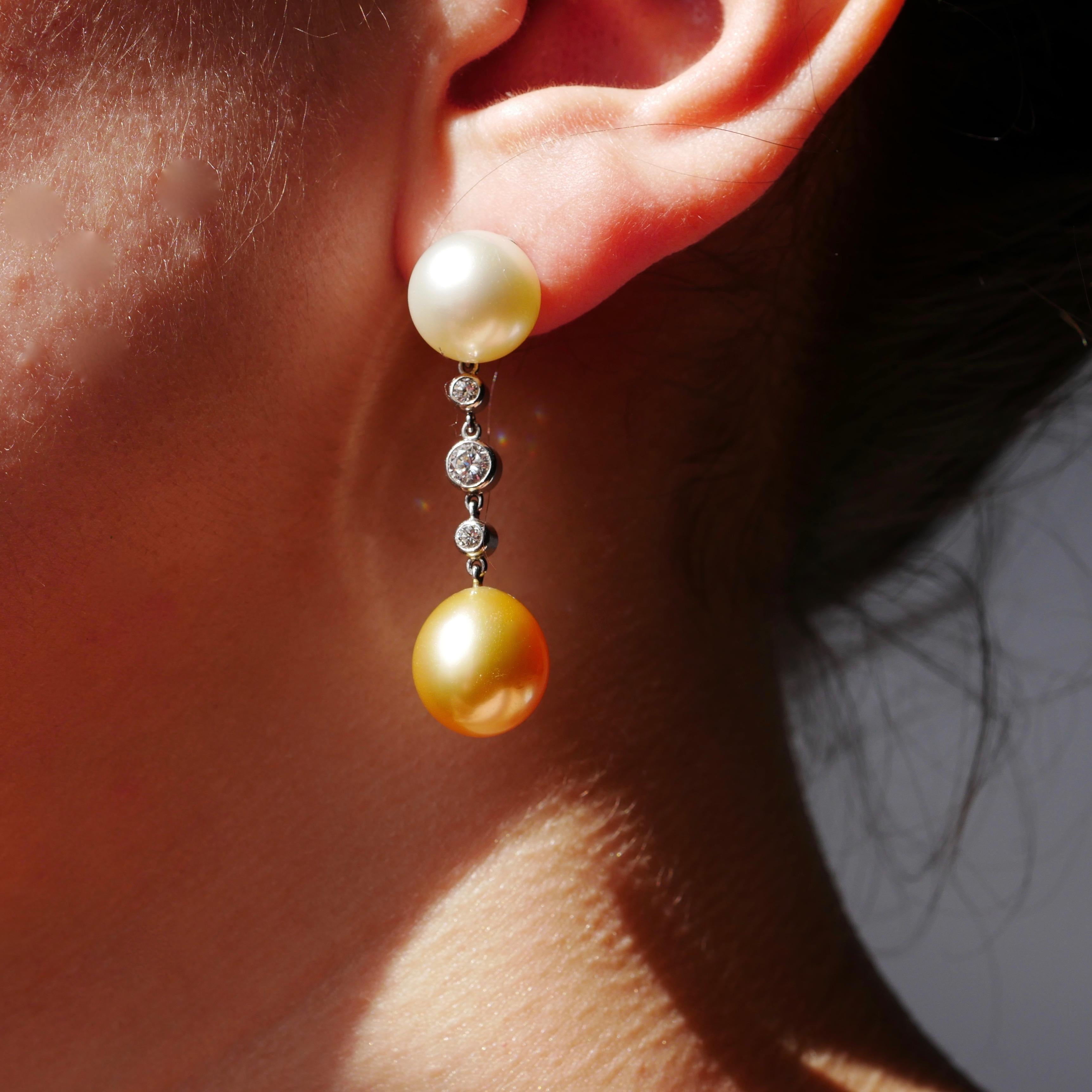 18k White Gold

Golden South Sea Cultured Pearls

Soft White South Cultured Sea Pearls 

.50ct Diamonds

H Colour VS Clarity 

A Beautiful Pair of Asymmetric Drop Earrings 

The soft white South Sea pearls and Golden South Sea pearls are between