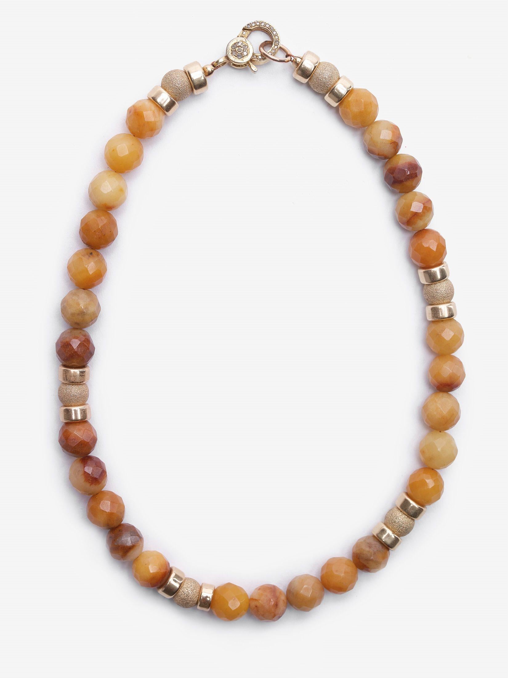 Story Behind the Jewelry
The exquisite combination of jade and tiger's eye makes this one of the favorites in the Jada Jo collection. The double style choker is designed with a tiger's eye buddha and adorned with 14K gold filled pavé
