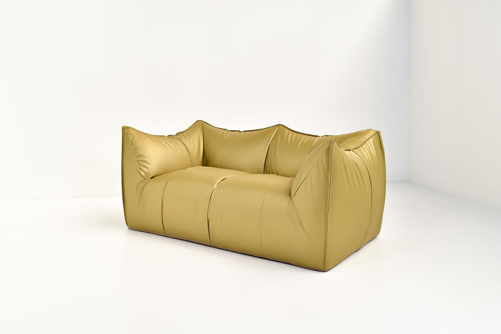 Two seater model, Bibambola, designed by Mario Bellini for B&B Italia, ca 1970s.
The Bibambola is a design classic. With the golden reupholstery we wanted to make classic meet contemporary. 
This way it can be the stand-out item you are looking