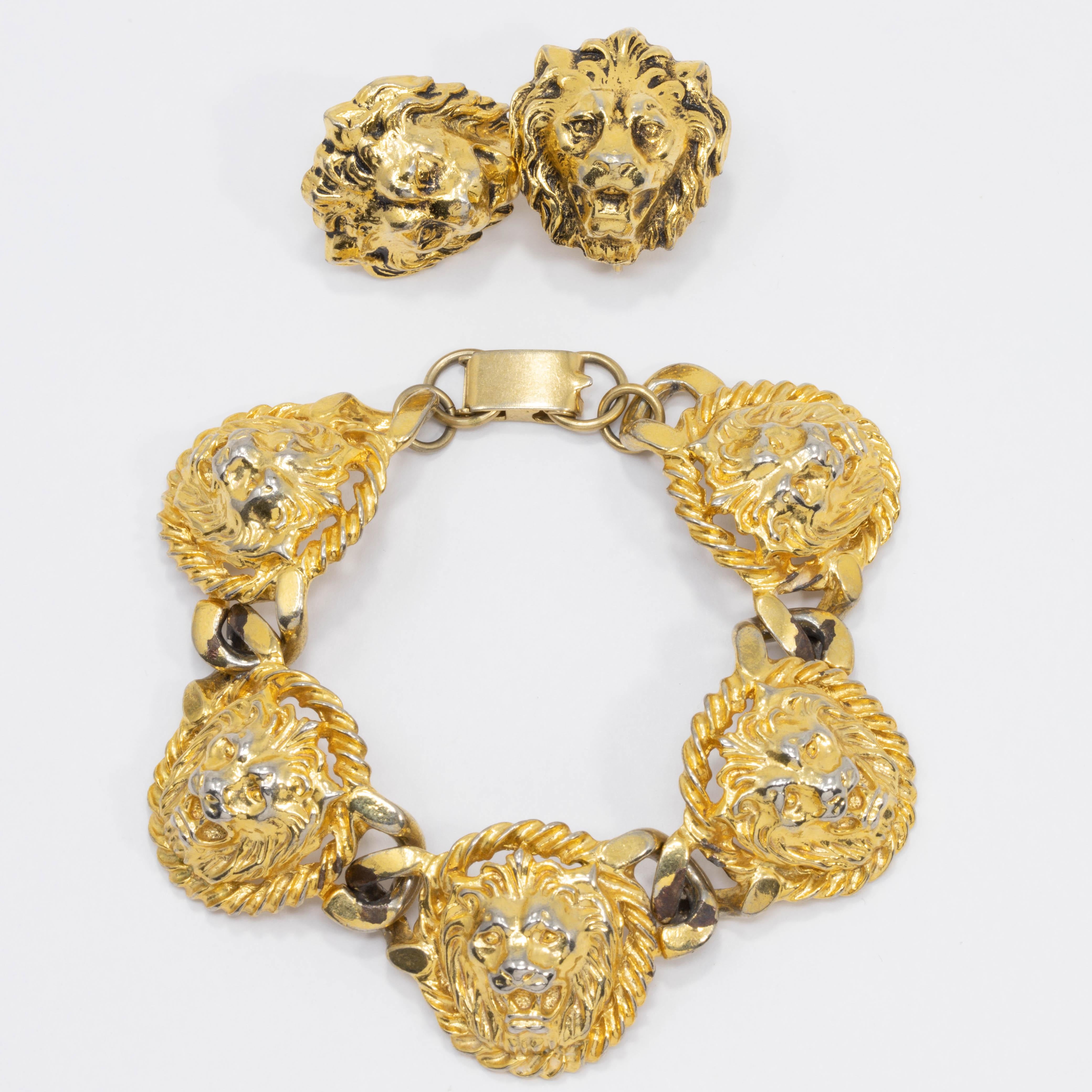 Make a statement with this majestic bracelet and earring set! Goldtone lion heads make up each link of the bracelet, as well as each clip on earring. 

Estimated production - mid 1900s.

Some wear of gold plating due to age.

Bracelet 18 cm / 7.25