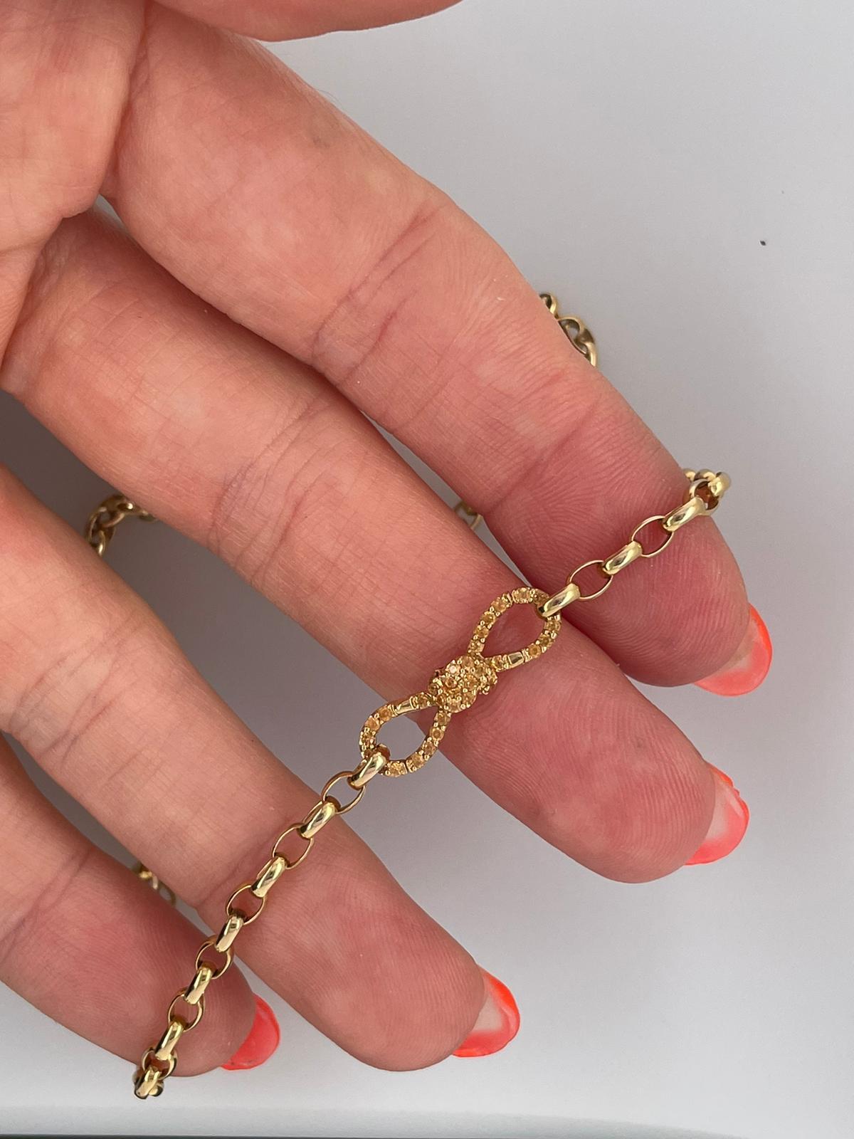 Golden Mandarin Garnet Bow pendant enhancer clasp in 18ct yellow gold For Sale 5