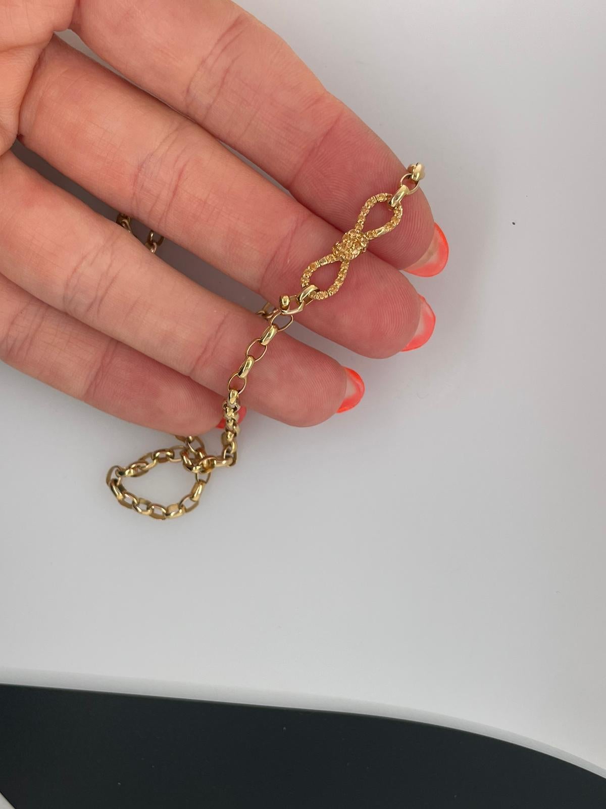 Round Cut Golden Mandarin Garnet Bow pendant enhancer clasp in 18ct yellow gold For Sale