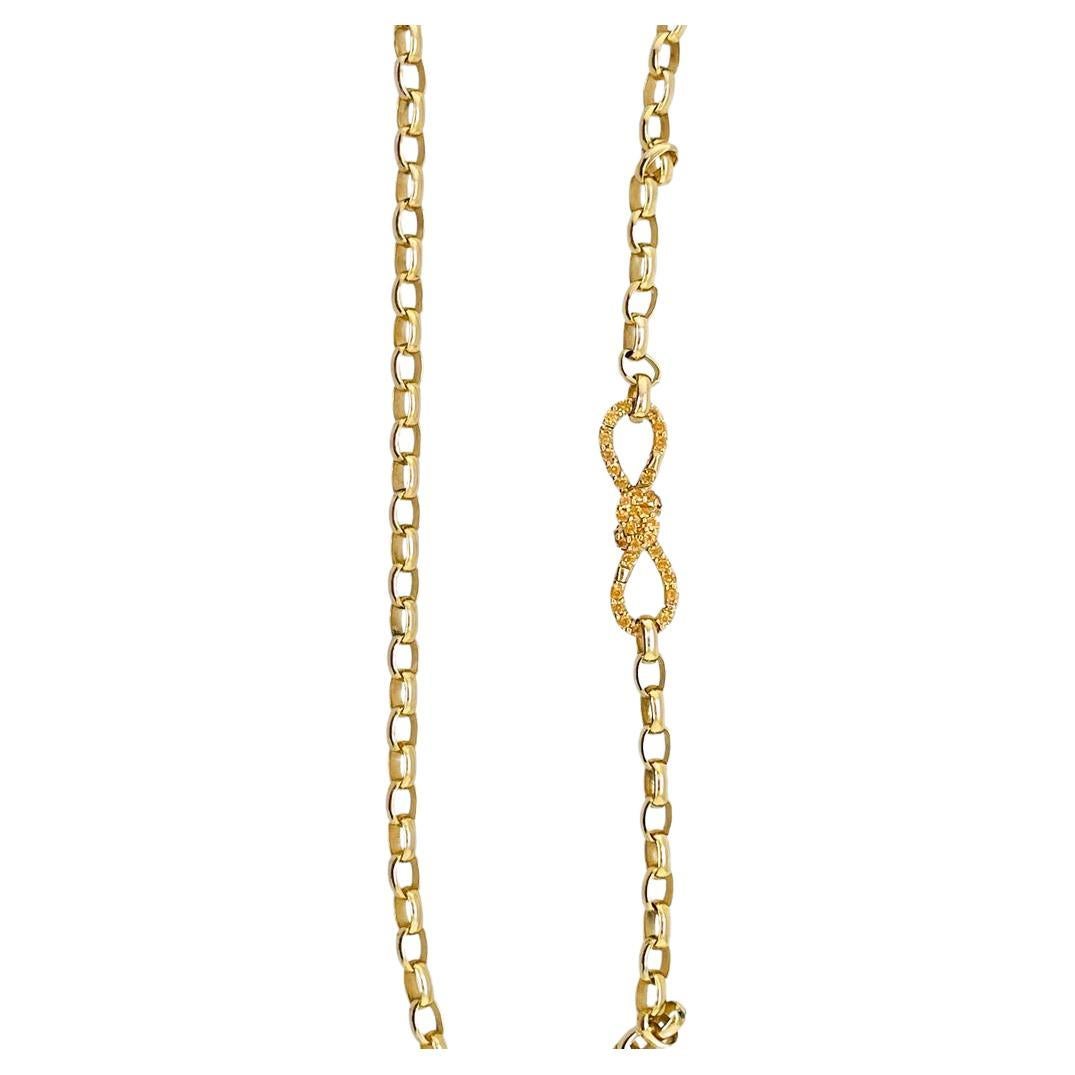 Golden Mandarin Garnet Bow pendant enhancer clasp in 18ct yellow gold For Sale