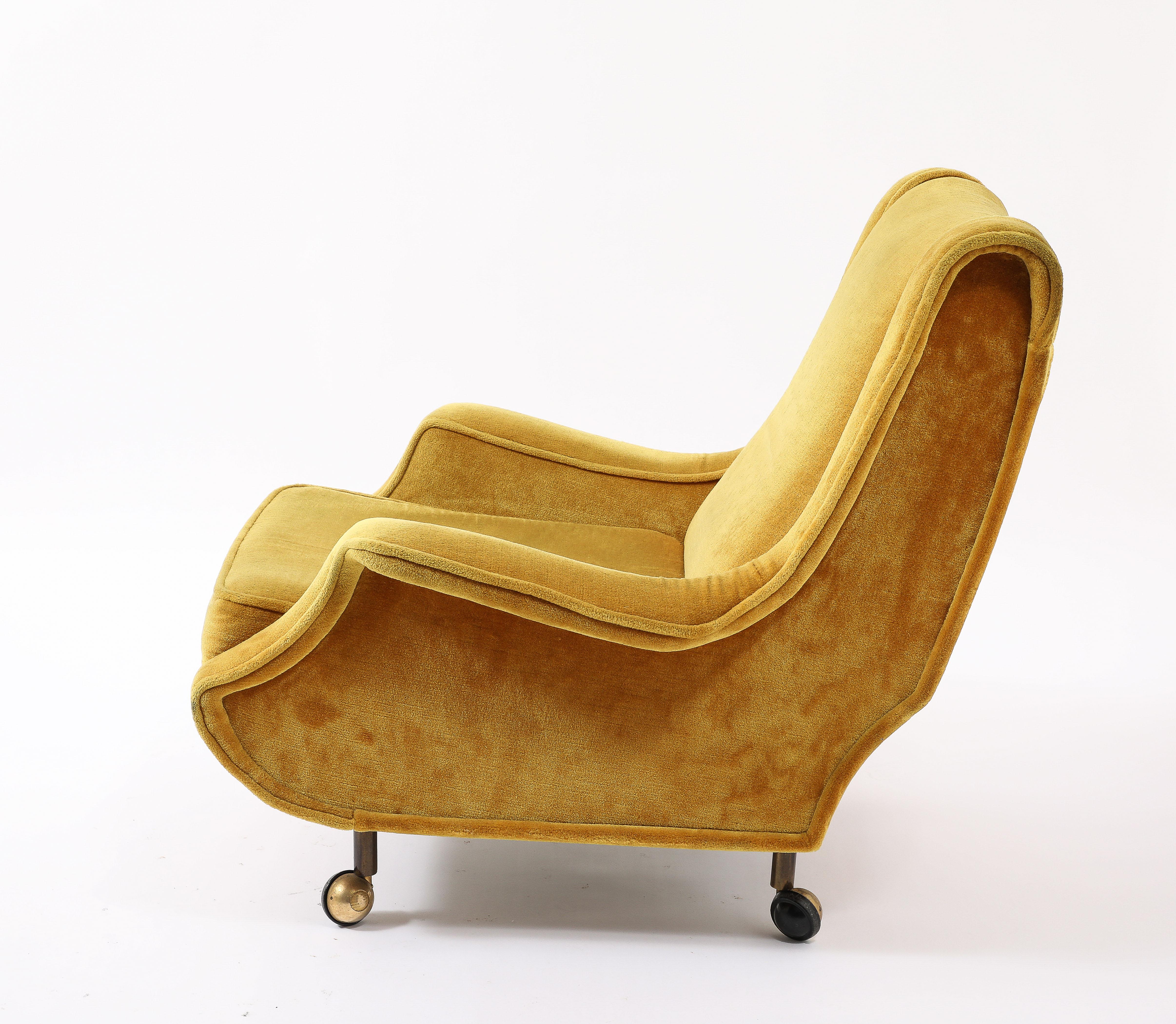 Classic Regent armchair by Marco Zanuso with its Ottoman, both on casters, we also have the round feet model.

32x32x31 
seat 18 arm 21
Ottoman 22x21x12