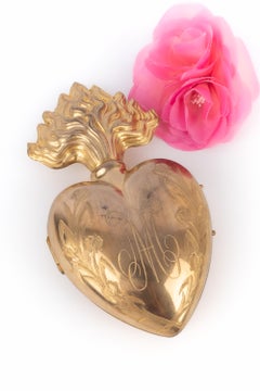 Coeur en métal doré ex voto