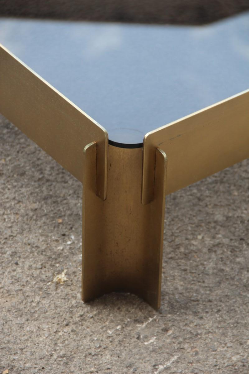 Golden metal table coffee minimal rationalist form square top glass Burchiellaro,
metal with joints, Burchiellaro style. Glass gray color top.