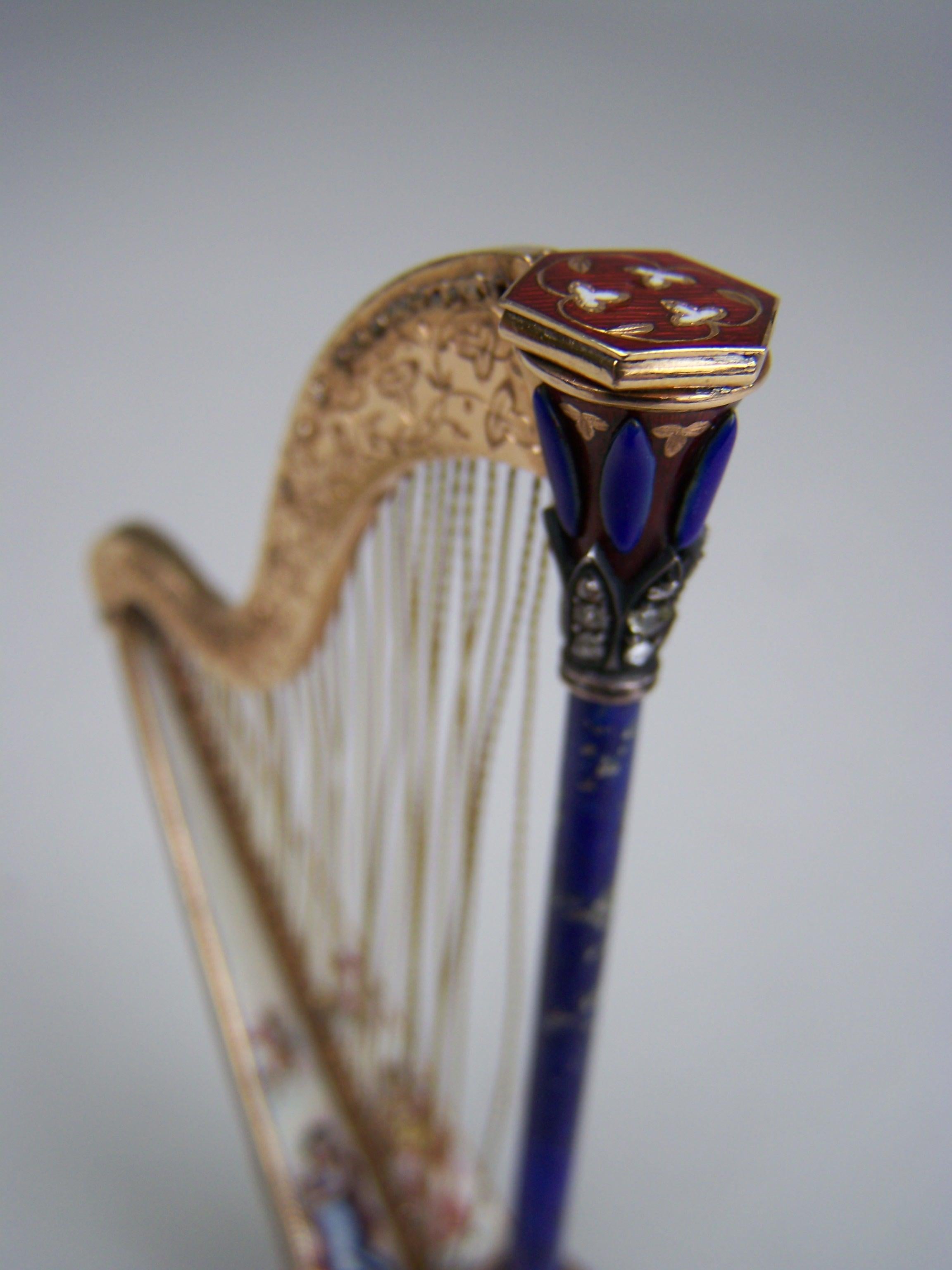 Metalwork Golden Musical harp with enamel and precious stones by Köchert AE. For Sale