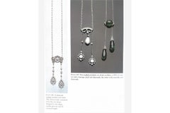 Golden negligée diamond necklace with little bow, early 20th century.