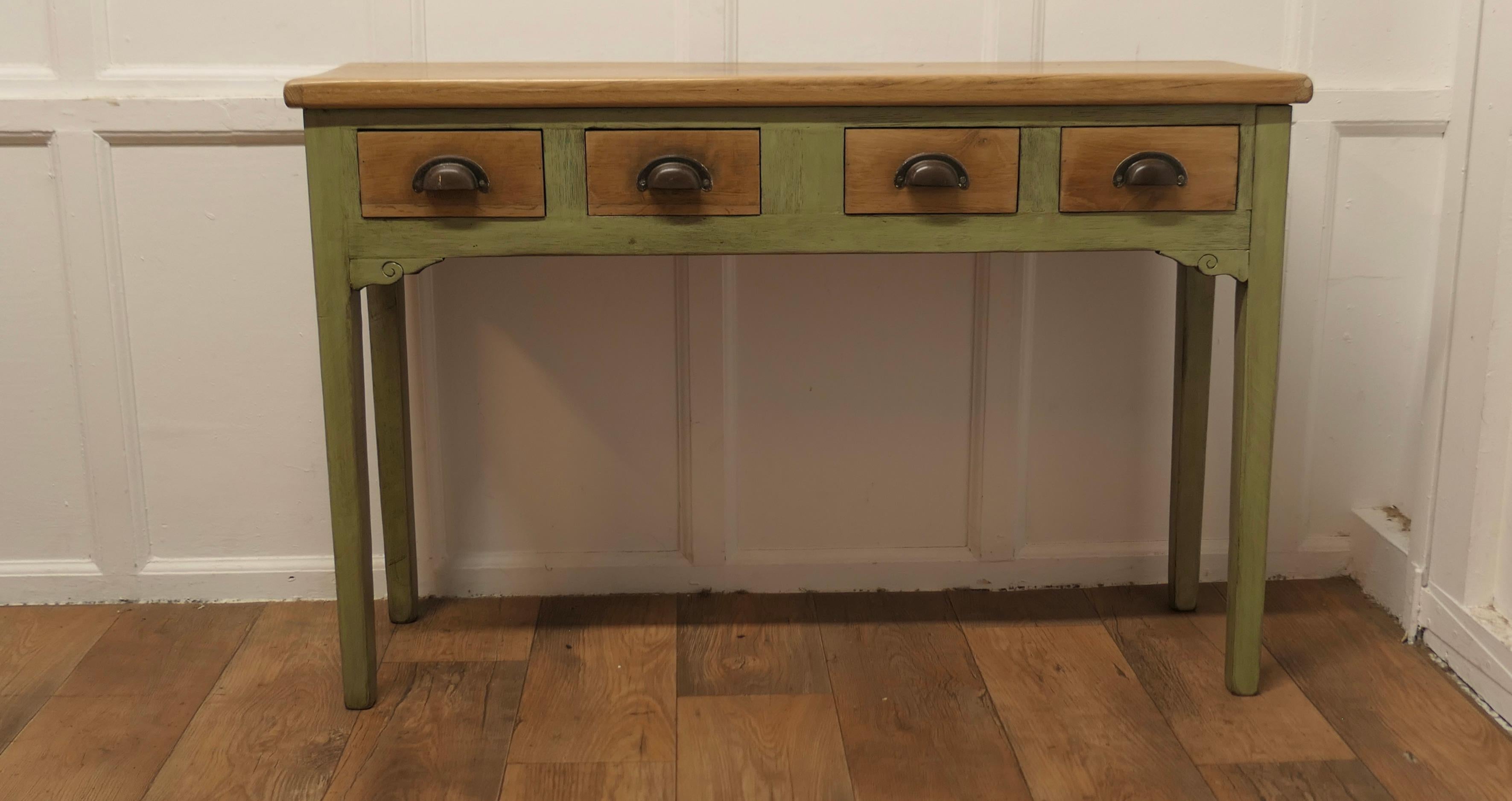Golden Oak and Olive Green Hall Table, Serving Table

This is a lovely country made piece it is made in Golden Oak which has a wonderful blonde patina, the legs have been  painted in Olive Green to give the table a more modern look
The table is set