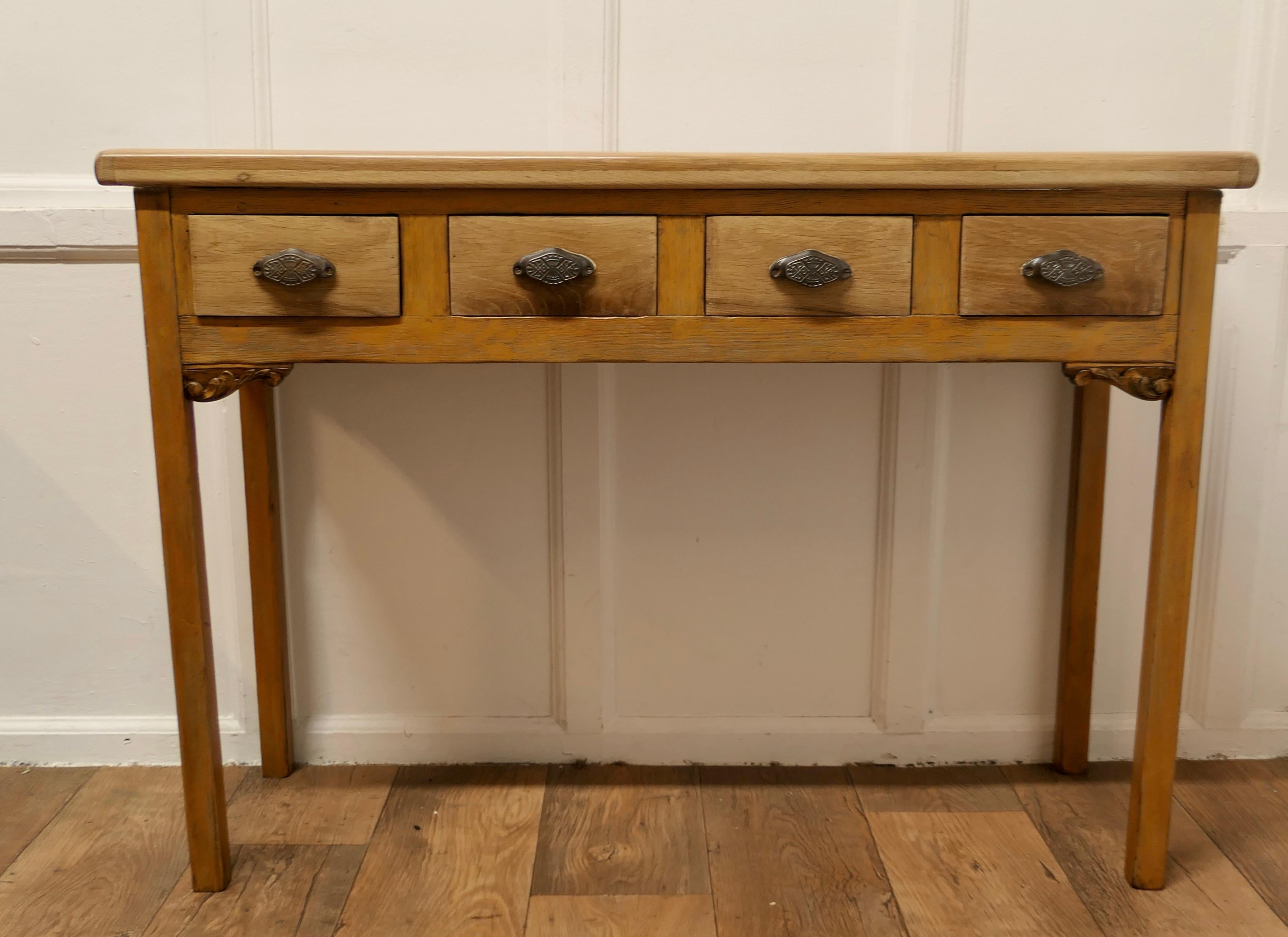 Golden Oak Hall Table, Serving Table

This is a lovely country made piece it is made in Golden Oak which has a wonderful blonde patina
The table is set on square legs and has 4 drawers to the front , it has a magnificent thick plank top with cleated