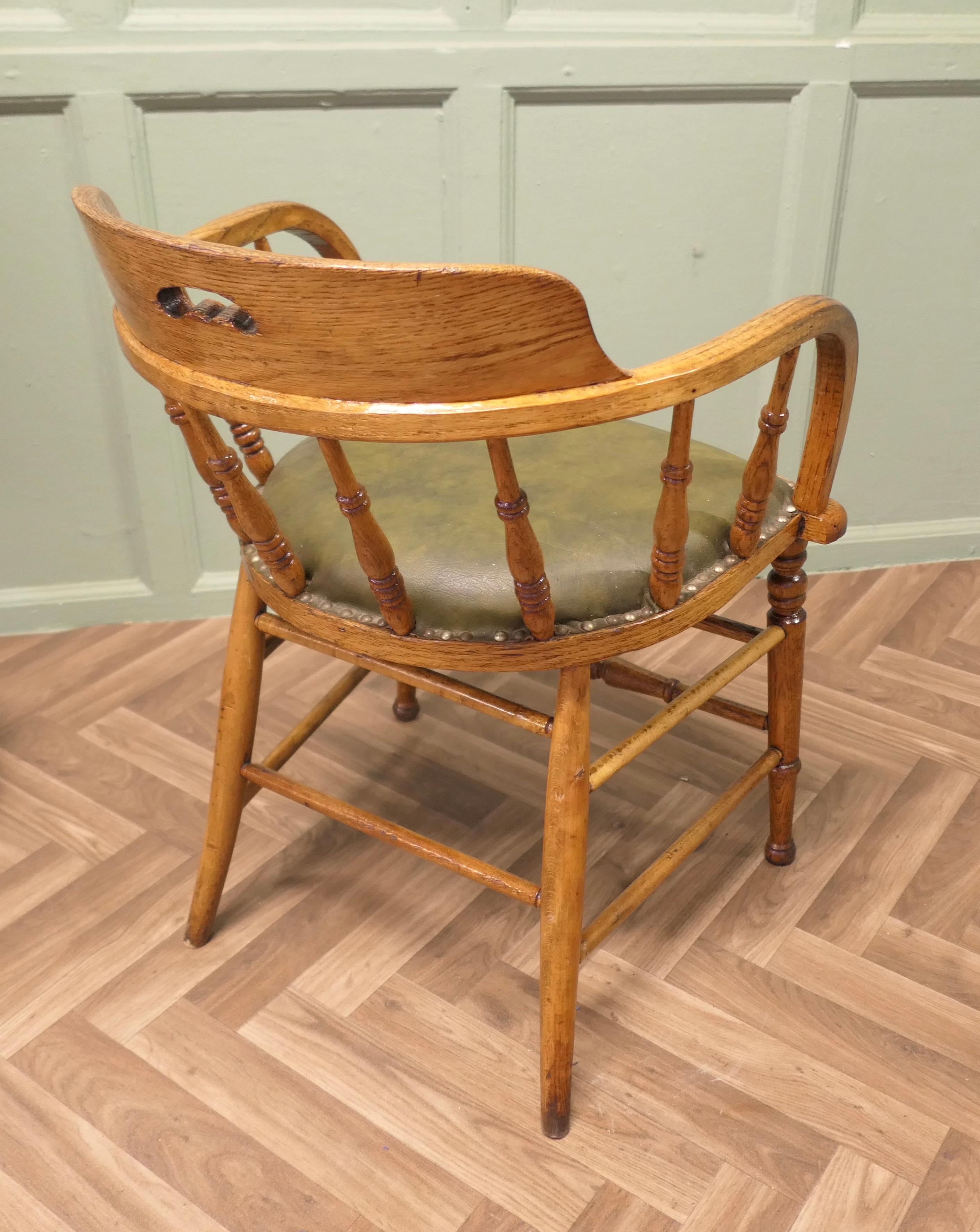 19th Century Golden Oak Smokers Bow Office or Desk Chair  This is a very attractive piece For Sale