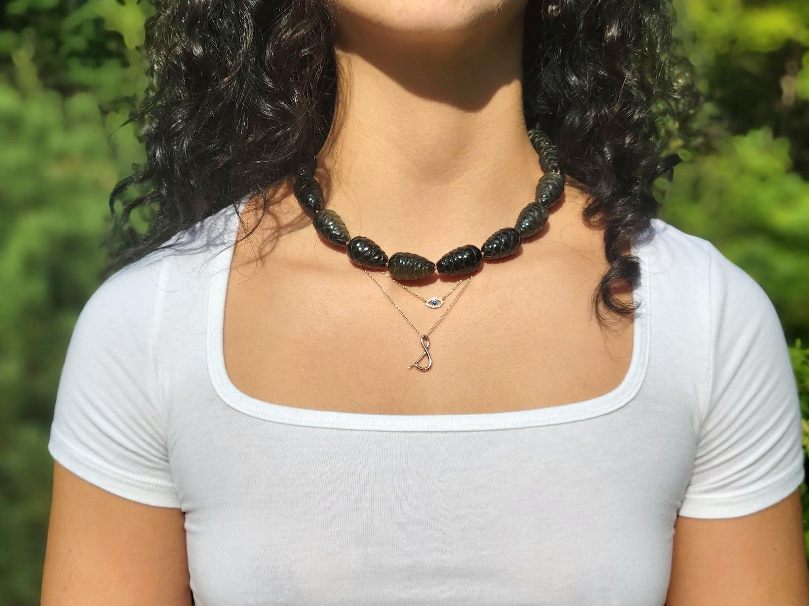 Donna Collana di ossidiana dorata in vendita