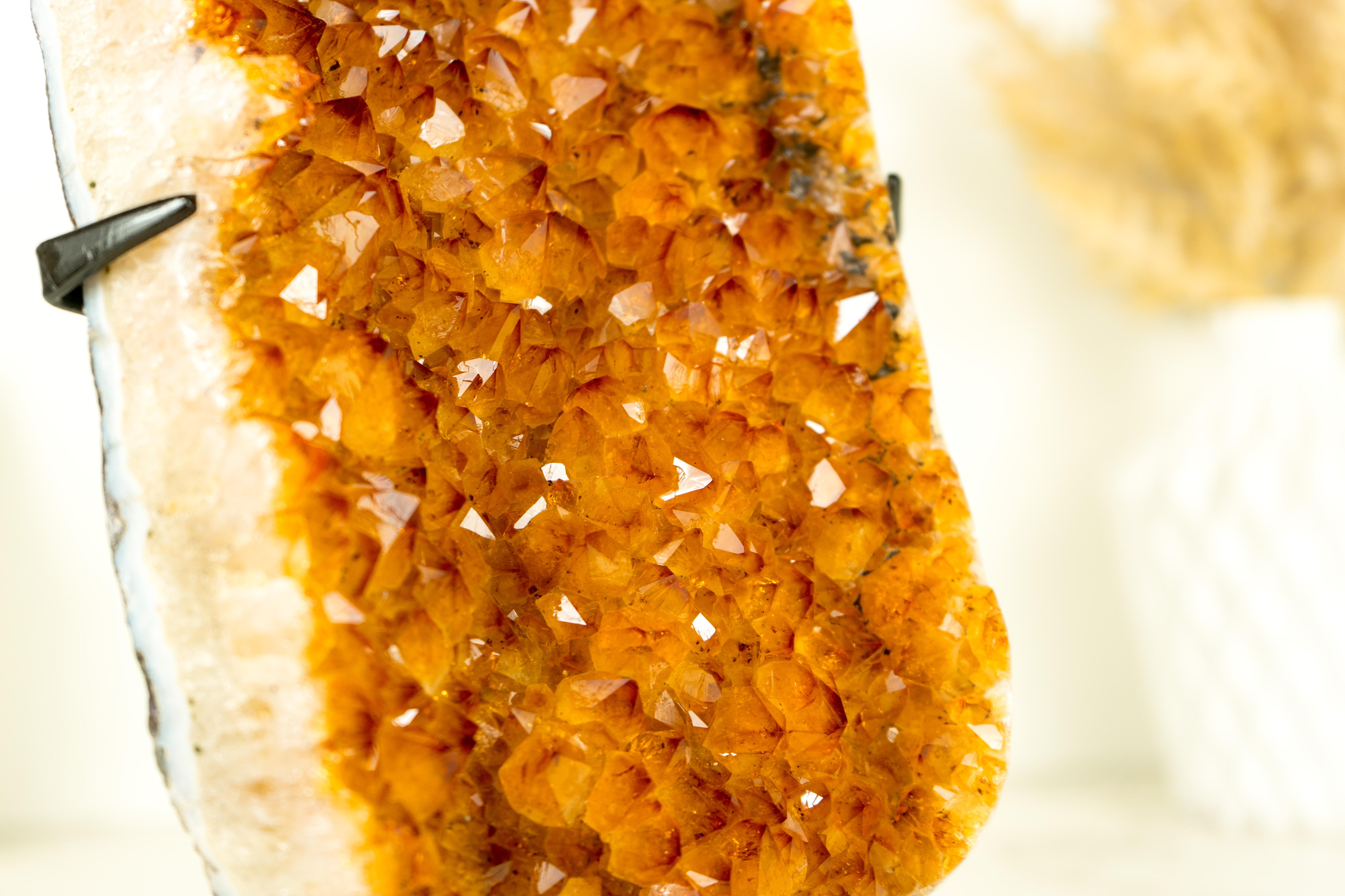 With its beautiful formations, radiant Golde Orange Citrine color, and wonderful aesthetics, this Citrine Specimen is the perfect addition to your crystal collection or a gorgeous decor piece for your console, table, or shelf.

The Golden Citrine is