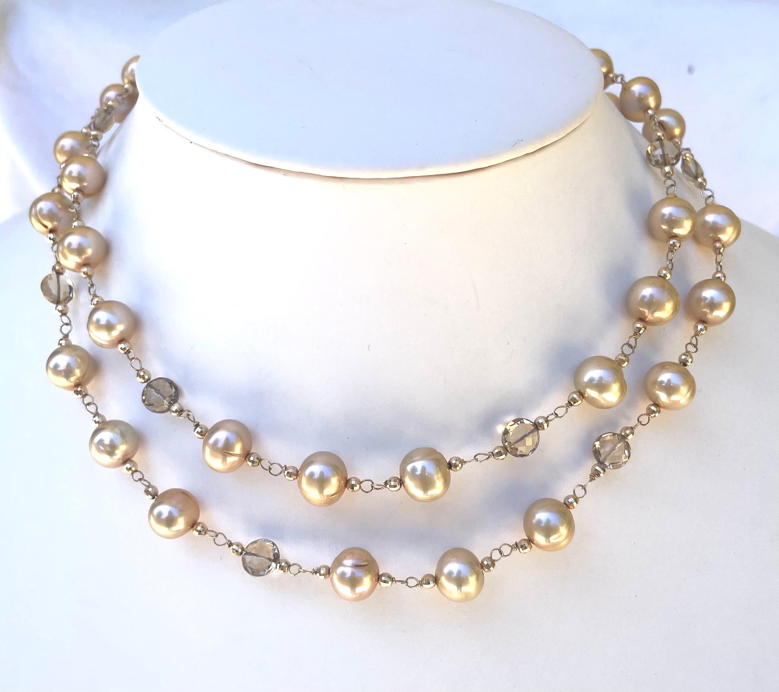 Description
Lustrous freshwater pearls accented with faceted coin shape champagne citrine and 14k yellow gold balls. Necklace can be worn long or short when doubled.
Item # N2015

Materials and Weight
Freshwater pearls, 10mm
Champagne citrine, 8mm,