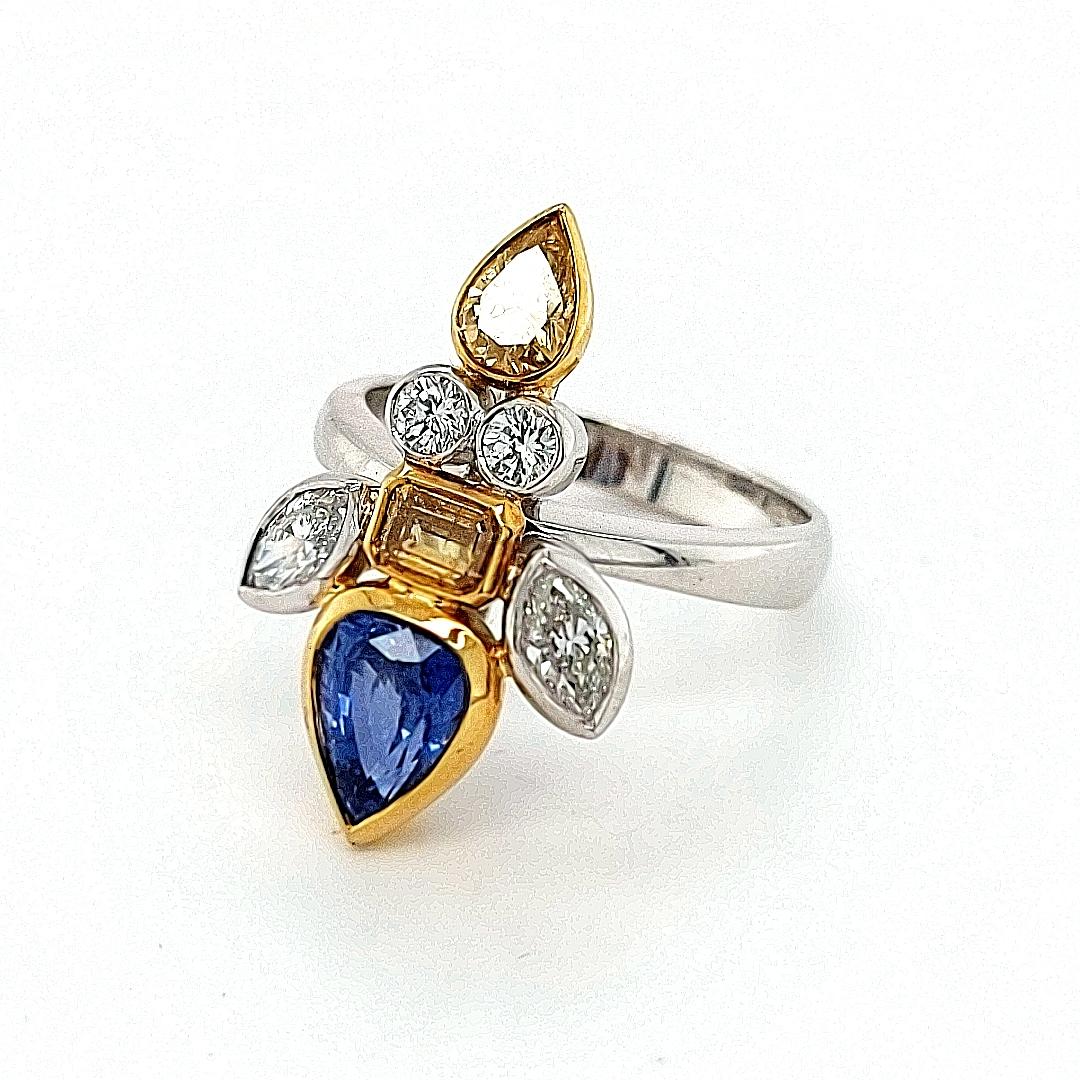 Artist 18kt Gold Ring Depicting a Fish, Set with 1.42ct Diamonds 1.78 Ceylon Sapphires For Sale