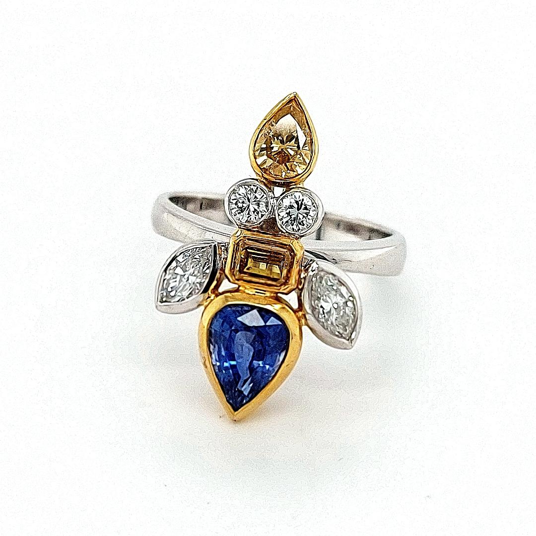 Pear Cut 18kt Gold Ring Depicting a Fish, Set with 1.42ct Diamonds 1.78 Ceylon Sapphires For Sale