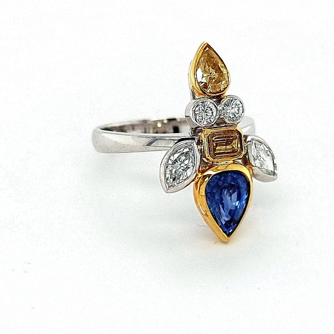 18kt Gold Ring Depicting a Fish, Set with 1.42ct Diamonds 1.78 Ceylon Sapphires In New Condition For Sale In Antwerp, BE