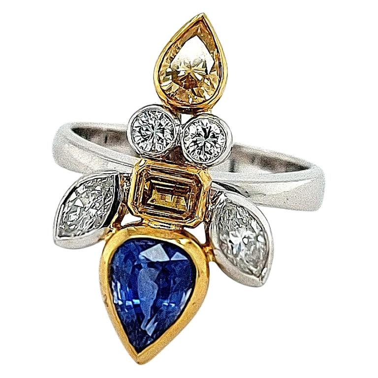 18kt Gold Ring Depicting a Fish, Set with 1.42ct Diamonds 1.78 Ceylon Sapphires For Sale