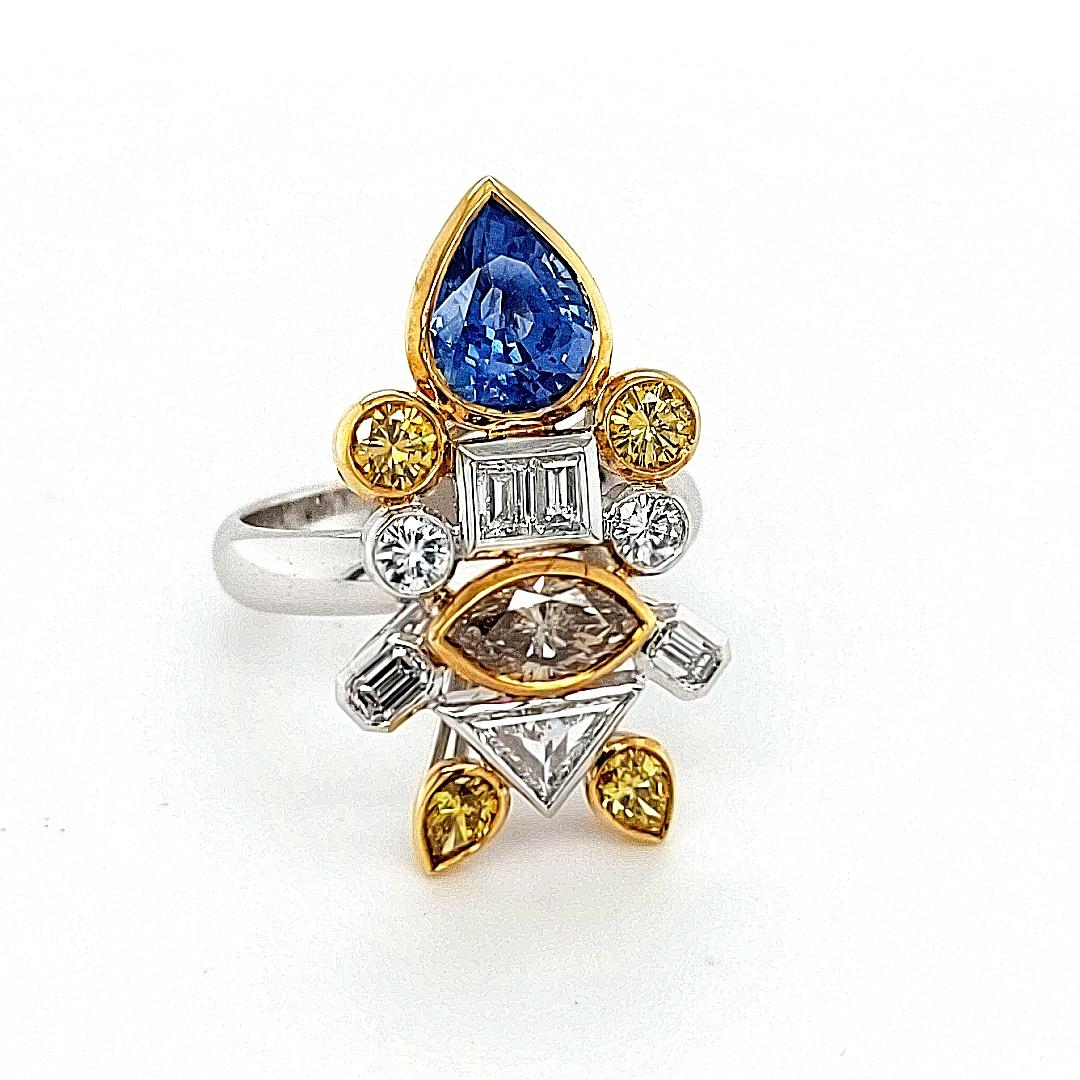 Artist 18kt white Gold Ring Depicting a Fish with 2.03ct Diamonds, 2.29ct Sapphires For Sale