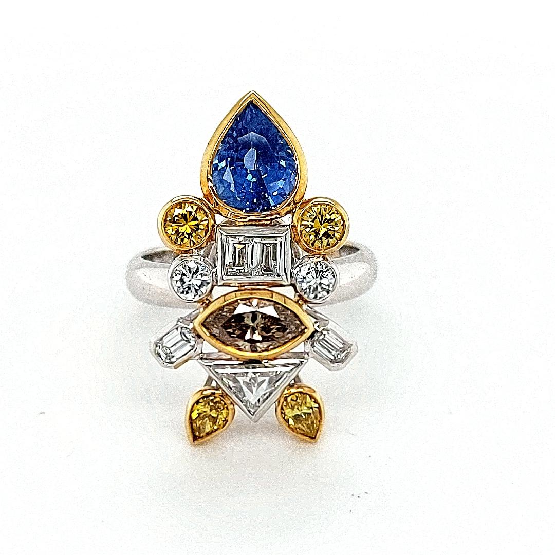 18kt white Gold Ring Depicting a Fish with 2.03ct Diamonds, 2.29ct Sapphires In New Condition For Sale In Antwerp, BE
