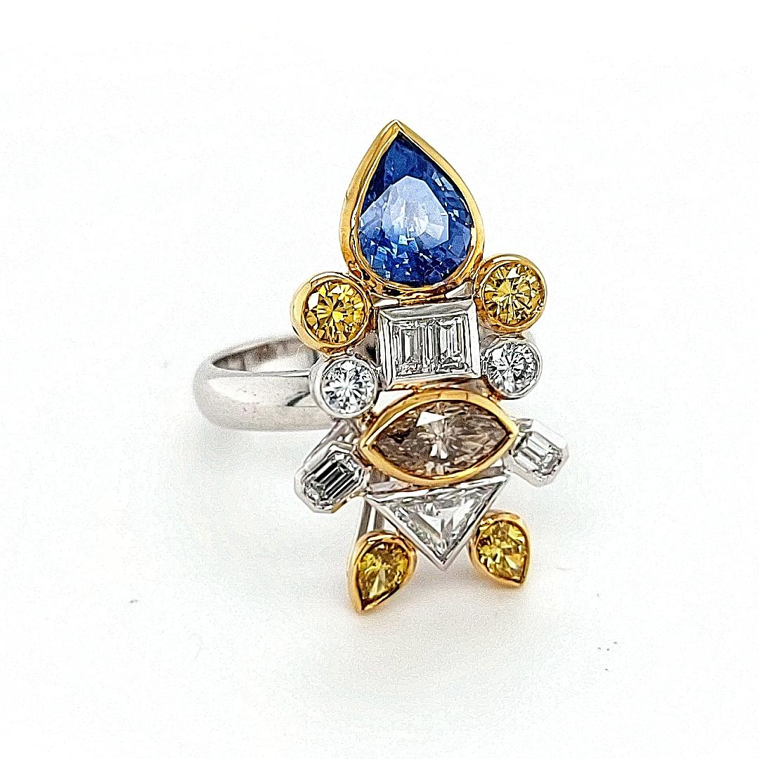 Women's or Men's 18kt white Gold Ring Depicting a Fish with 2.03ct Diamonds, 2.29ct Sapphires For Sale