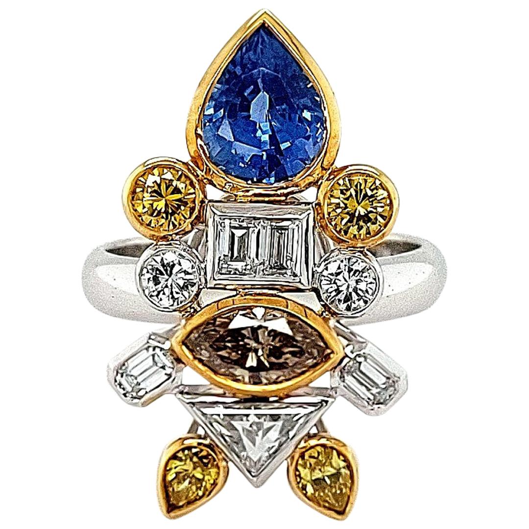 18kt white Gold Ring Depicting a Fish with 2.03ct Diamonds, 2.29ct Sapphires