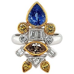 18kt white Gold Ring Depicting a Fish with 2.03ct Diamonds, 2.29ct Sapphires