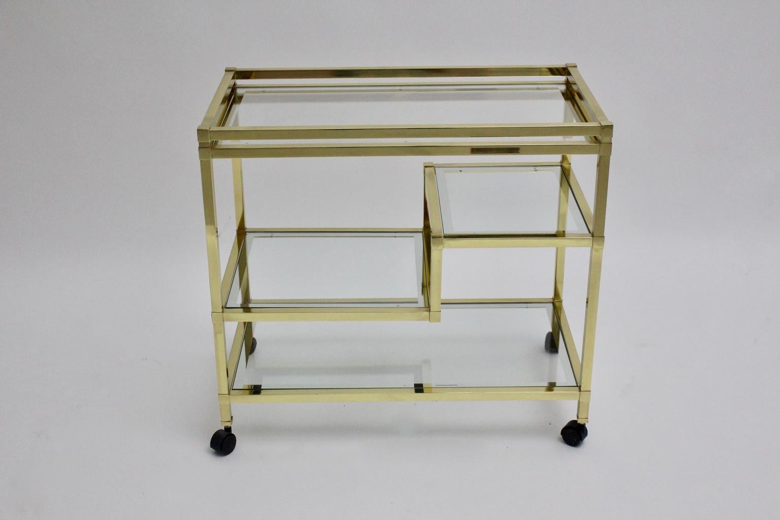 Italian Golden Metal and Glass Vintage Bar Cart in the style of Romeo Rega Italy, 1970s For Sale