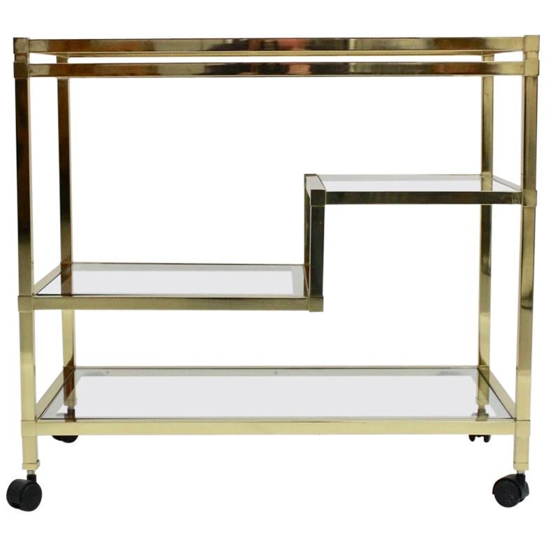 Golden Metal and Glass Vintage Bar Cart in the style of Romeo Rega Italy, 1970s For Sale