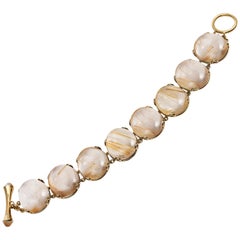 Bracciale Goshwara con cabochon ovale in rutilato d'oro