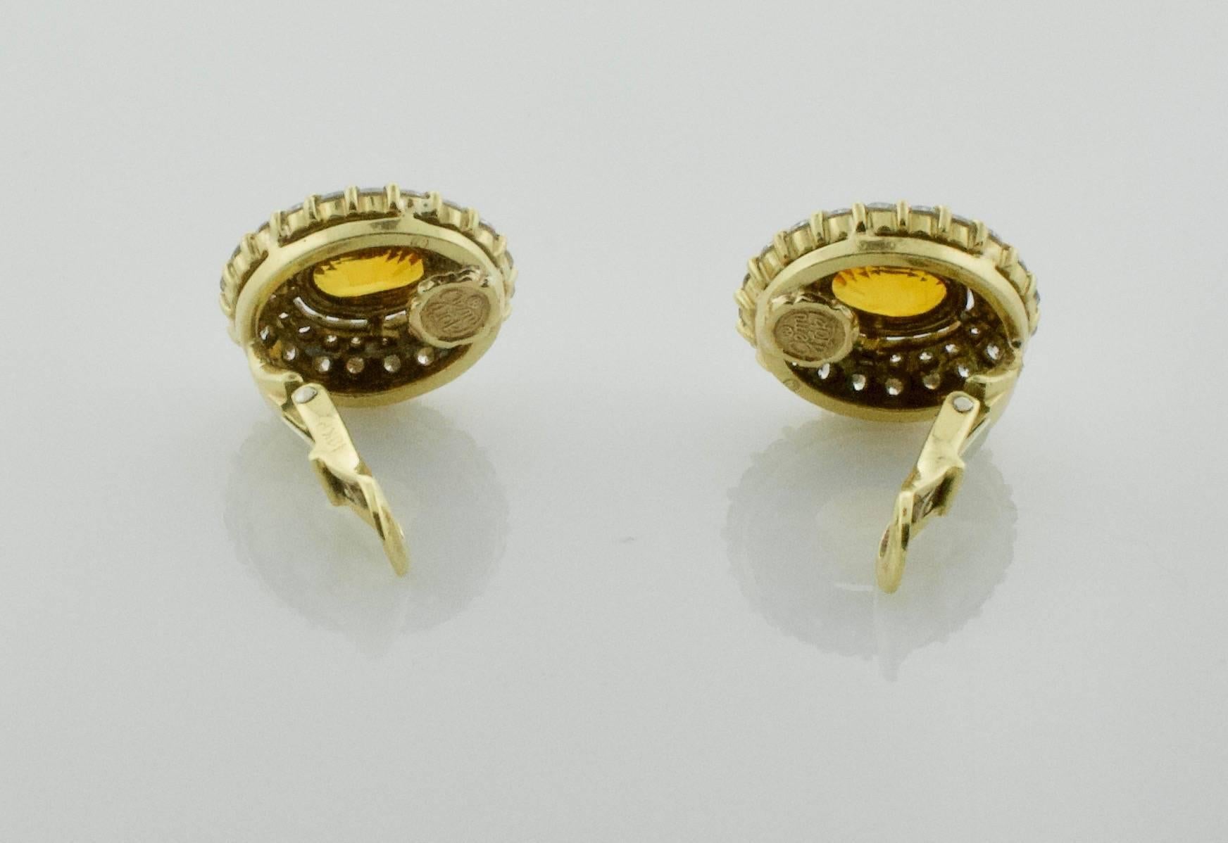 Modern Golden Sapphire and Diamond Clip Earrings in 18 Karat For Sale