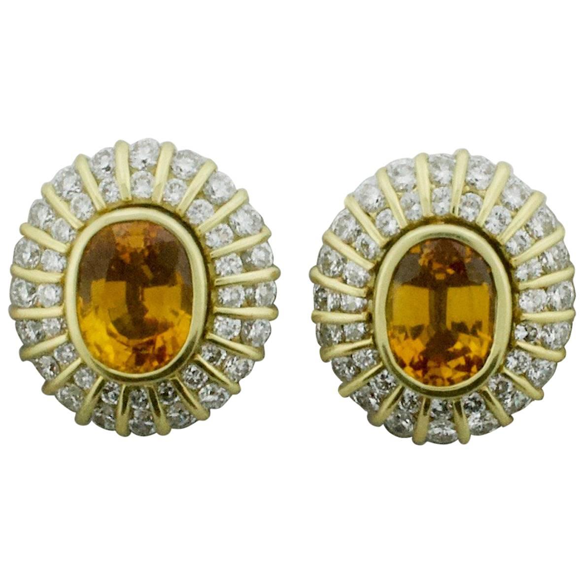 Golden Sapphire and Diamond Clip Earrings in 18 Karat For Sale