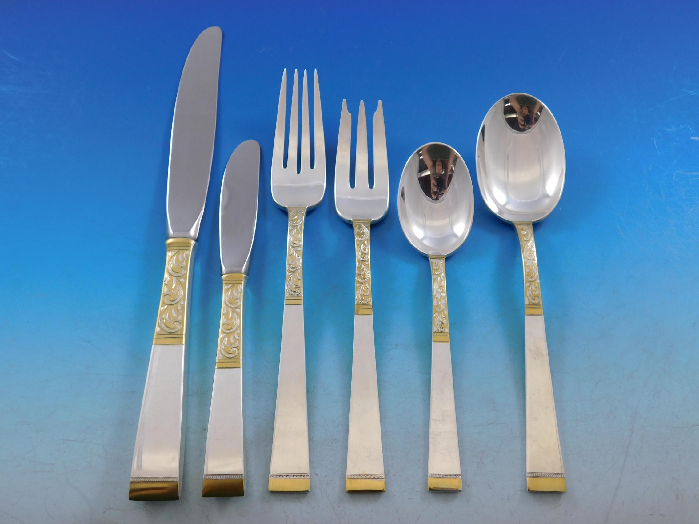 Golden scroll by Gorham sterling silver flatware set, 57 pieces. This set includes:

8 knives, 9 1/8
