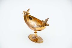 Golden silver gravy boat