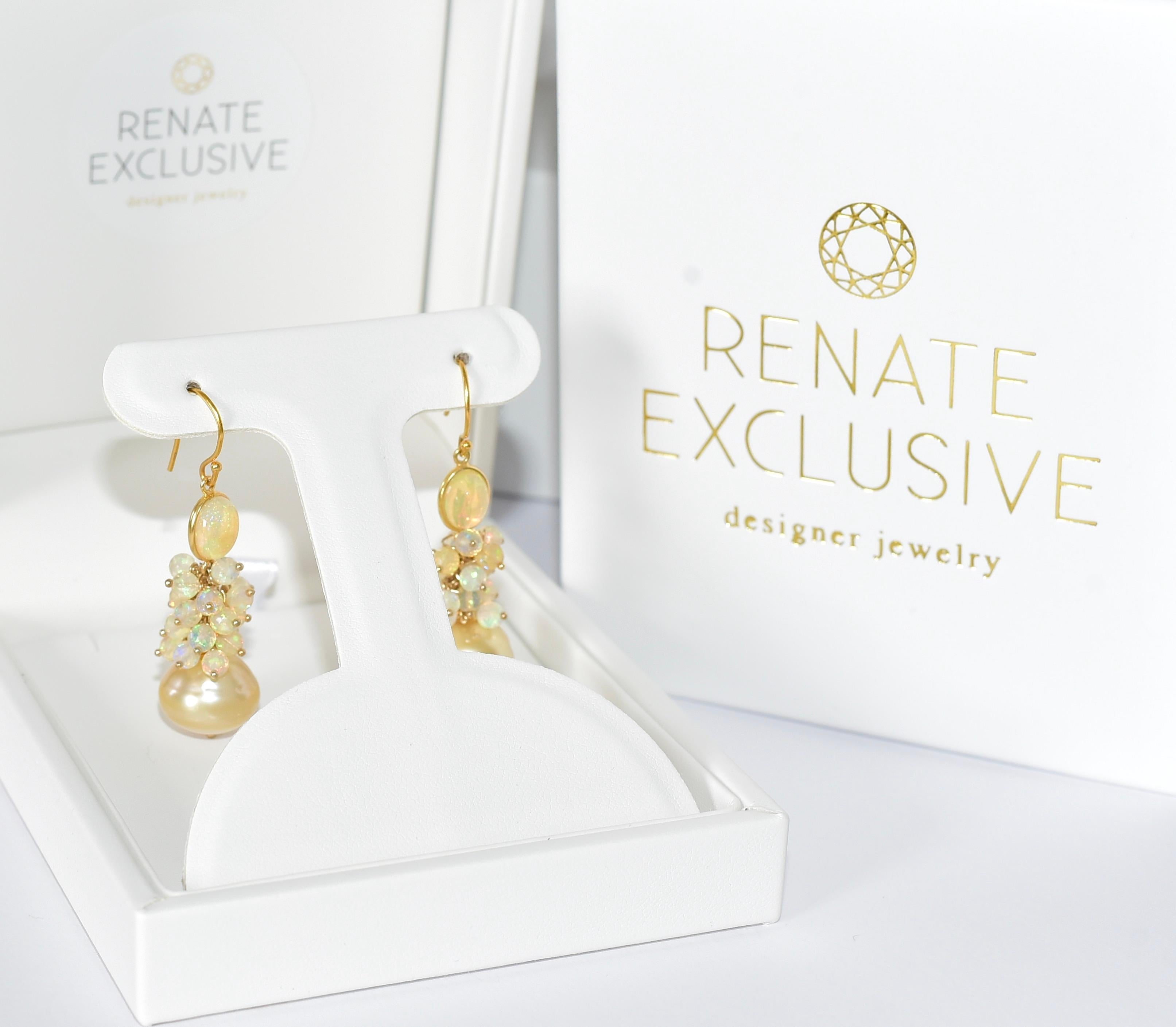 Elegant Golden South Sea Pearl (14mm) earrings with amazing Ethiopian Crystal Opal beads (4mm)! Natural 18K Solid Yellow Gold Opal bezel connector combines all this beauty! Breathtakingly beautiful and unique look and absolutely must-have for opal