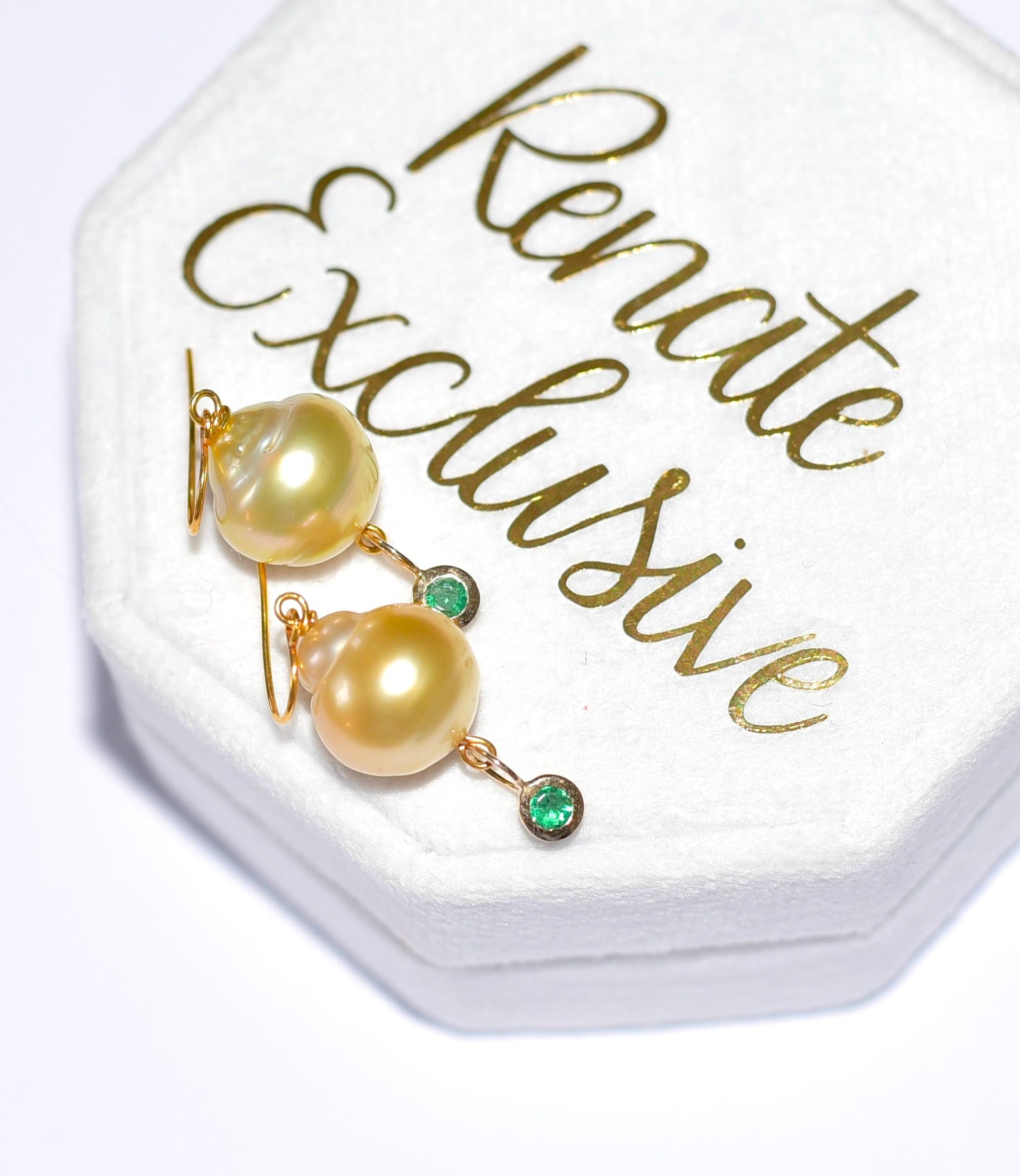 Light Golden South Sea Pearl and Natural Emerald in 18K Solid Yellow Gold. Classic look and elegant style! 
Length: 1.5 inches
Pearl size: 13mm x1 3,5mm

Before you make a purchase, make sure you want unique handmade jewelry made of high-quality