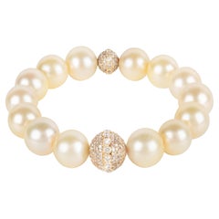 Golden South Sea Pearl Bracelet with Two 18k Yellow Gold Diamond Encrusted Orbs