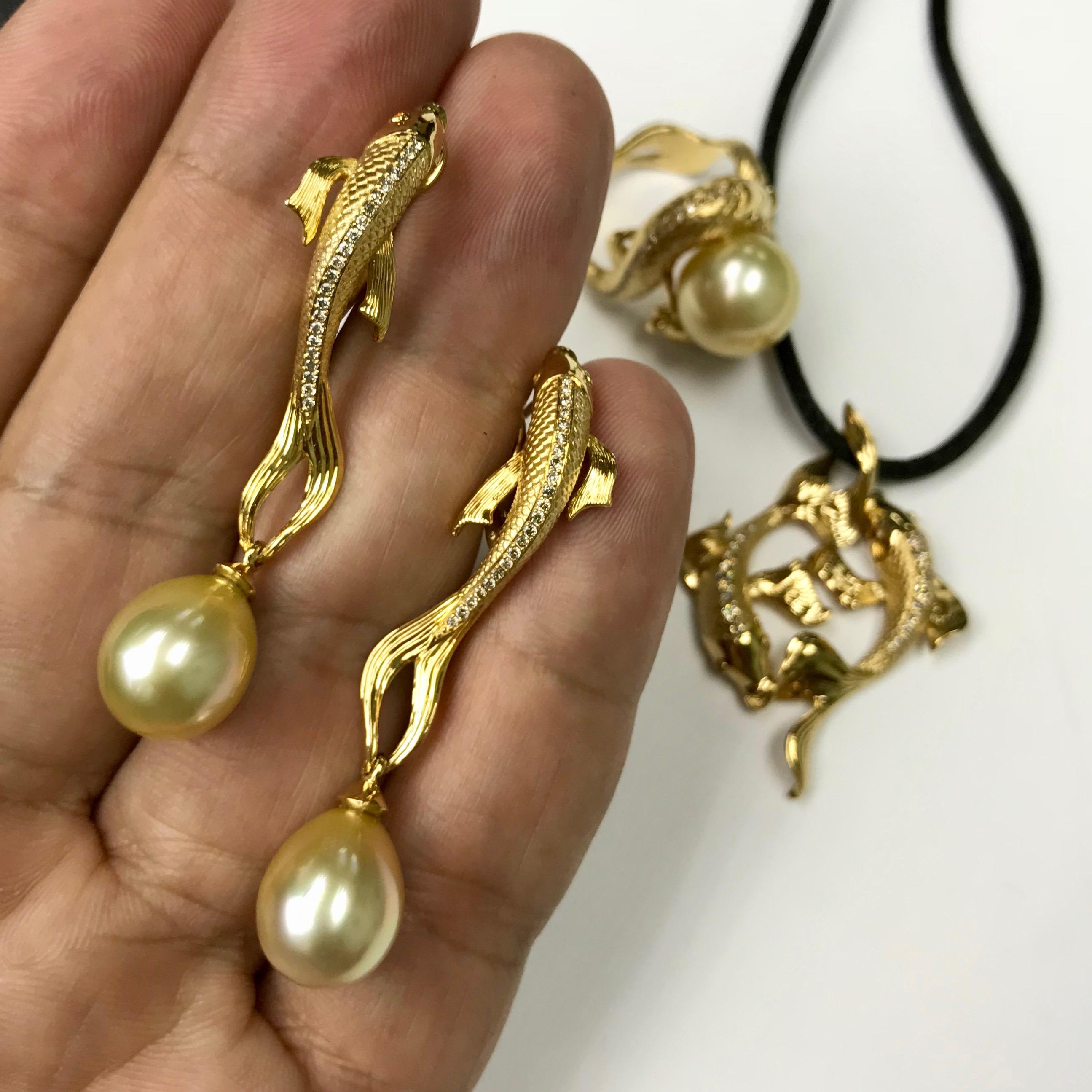 Golden South Sea Pearl Brown Diamonds Fish Earrings

Did you see the sunlight playing on the scales of the fish? The combination of Champagne Diamonds together with the Golden Pearls are stunning. All over the world fish symbolised abundance,